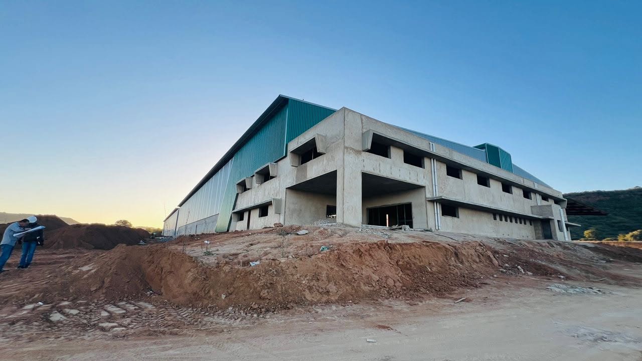 Clad warehouse frame and concrete office structure at the Gabane project in Botswana