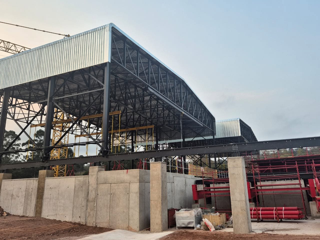 Completed roof sheeting over erected steel portal frames at Key Ridge